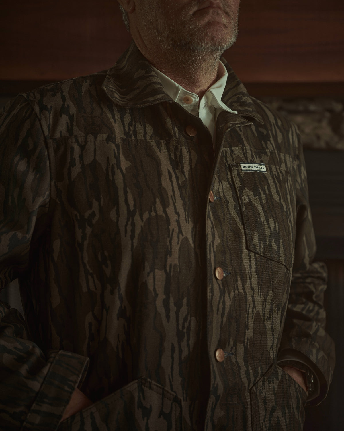 Men's Bottomland canvas jacket, front, with copper buttons and the Blue Delta chest tab