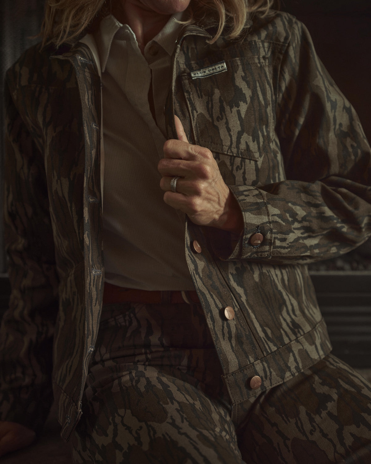 Women's Bottomland canvas jacket, front, with copper buttons and the Blue Delta chest tab