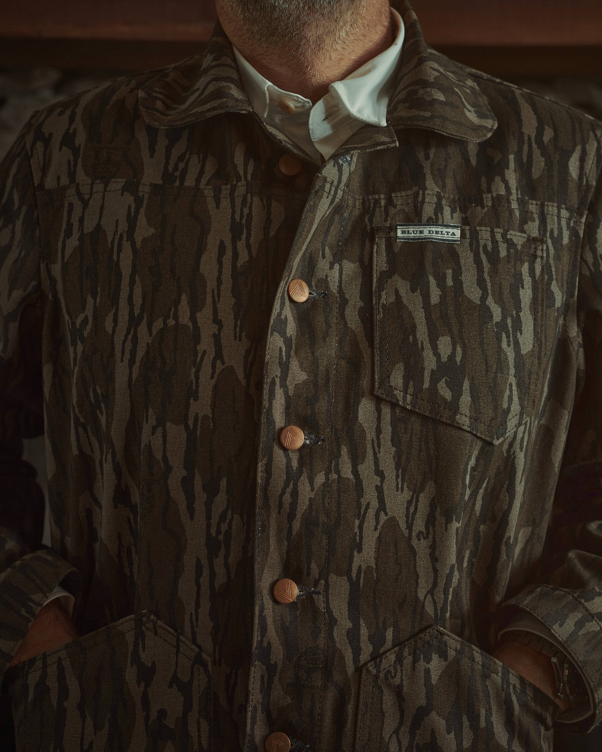 Men's Bottomland canvas jacket worn with hands in the pockets
